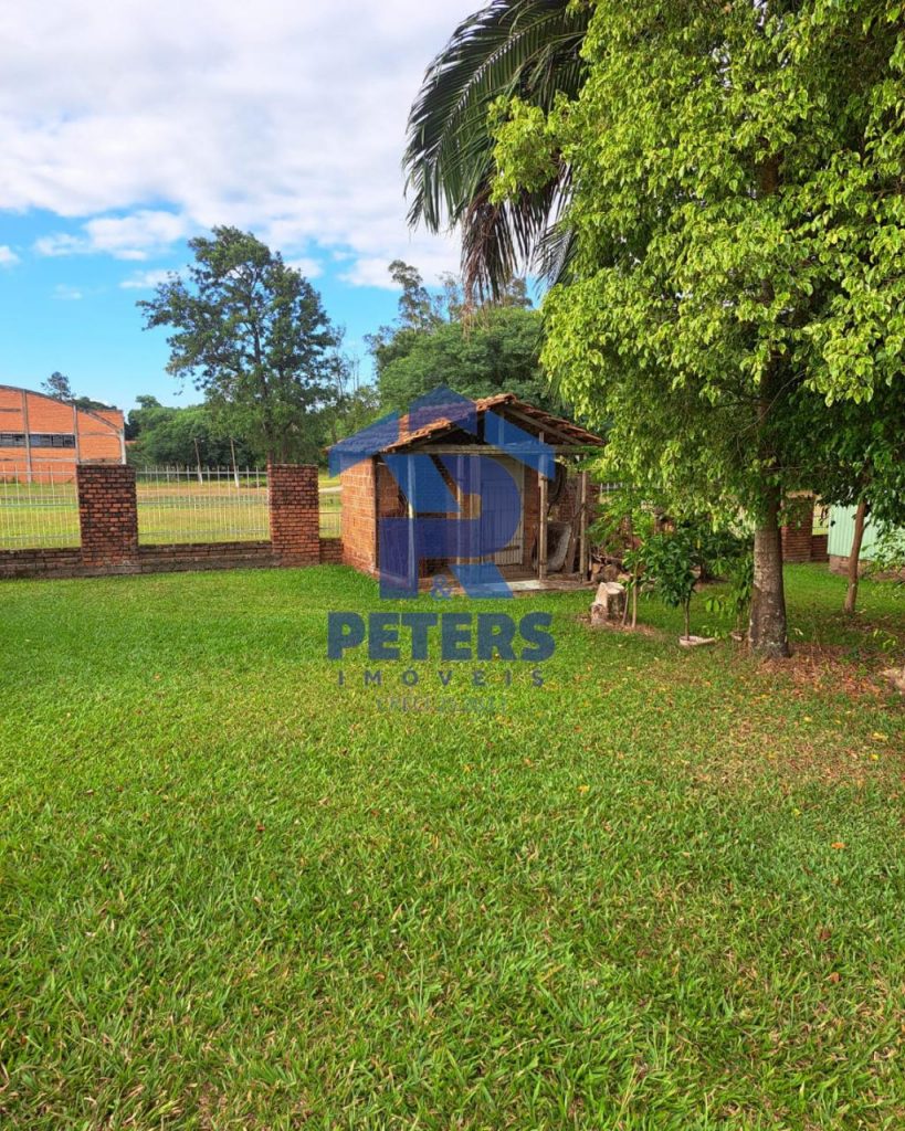 Amplo terreno com casa
