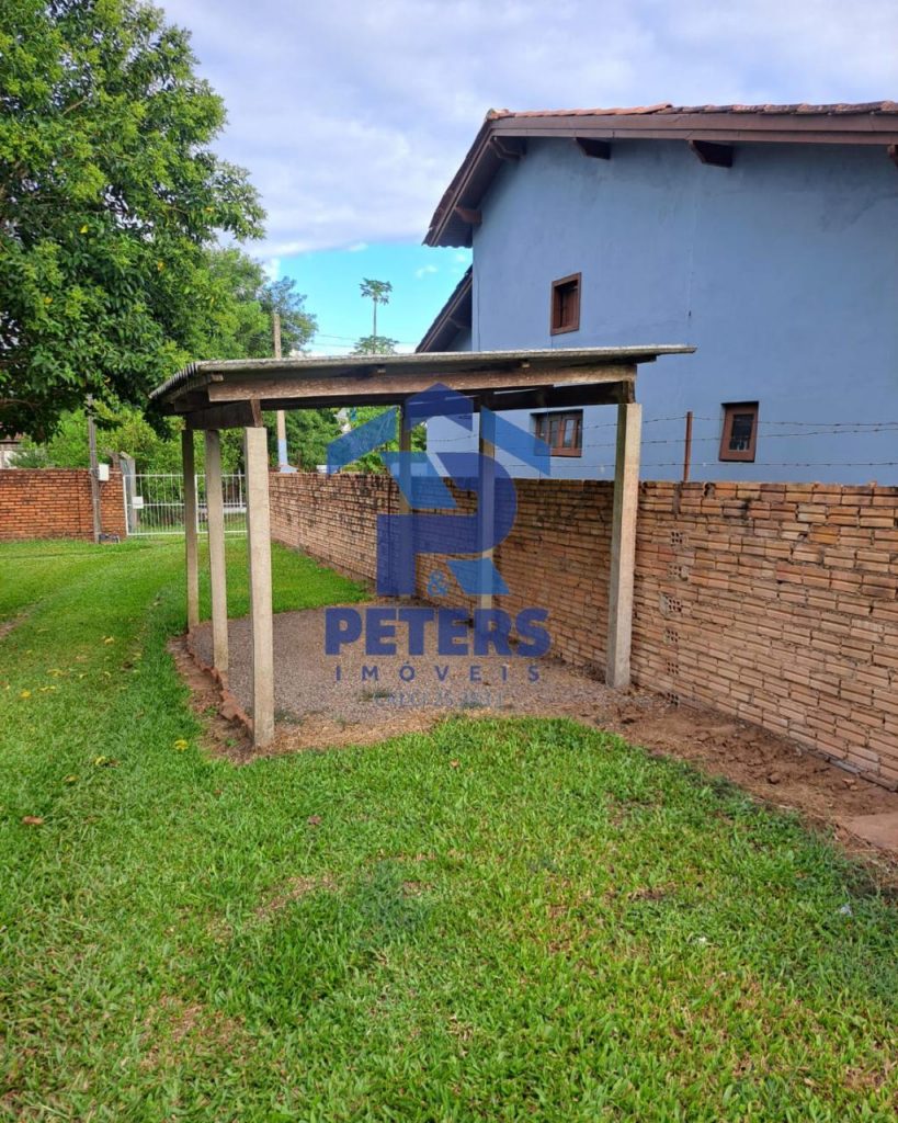 Amplo terreno com casa